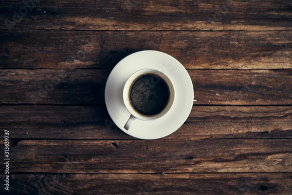 Fototapeta Top view of coffee cup on background..