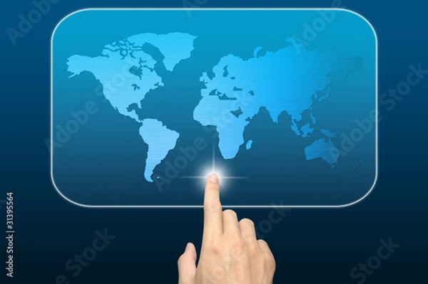 Fototapeta hand pushing a world map on a touch screen interface