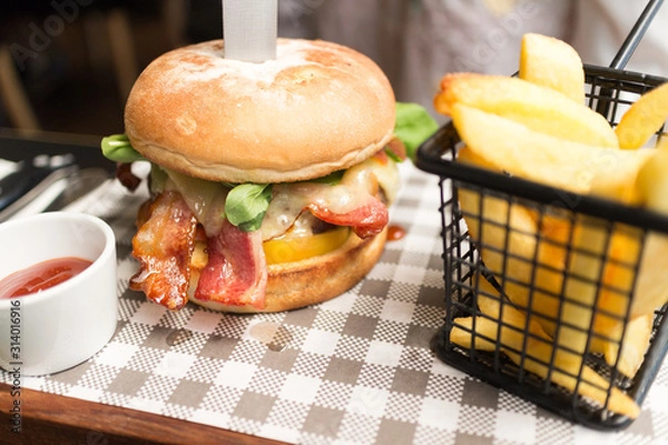 Obraz Bacon hamburger set on check paper