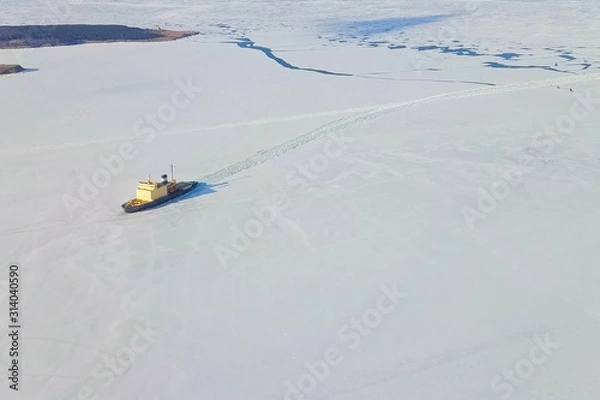 Fototapeta Ice-enpalled naldo, ice breaking ship.