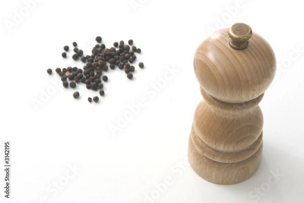 Fototapeta pepper mill with peppercorns