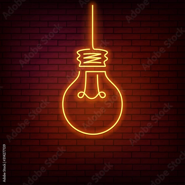 Obraz Yellow neon sign with a light bulb on a red brick wall background.