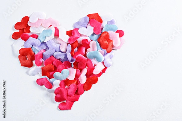 Obraz small multicolored hearts on white background