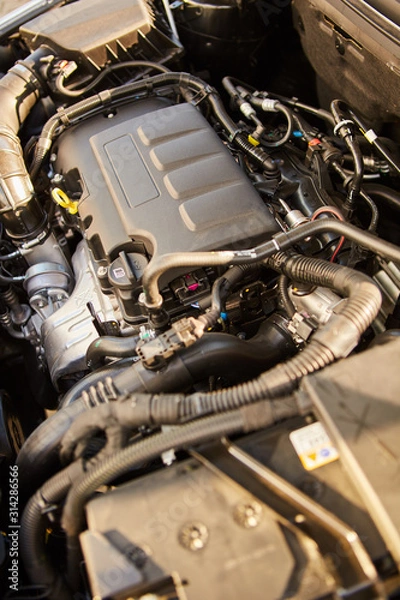 Fototapeta Closeup photo of a clean motor block