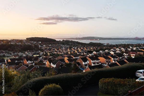 Obraz View over residential area from a balcony during sunrise in Edinburgh in Scotland