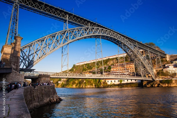 Fototapeta Dom Luis I Bridge a metal arch bridge over the Douro River between the cities of Porto and Vila Nova de Gaia in Portugal inaugurated in 1886