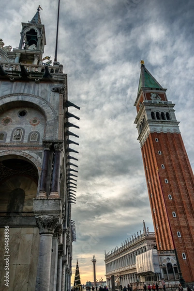 Fototapeta Piazza San Marco in Venice. Venice is famous for its settings, archtecture and artwork. A part of Venice is resignated as a World Heritage site.