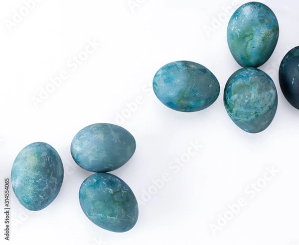 Fototapeta Different aquamarine easter eggs on white background
