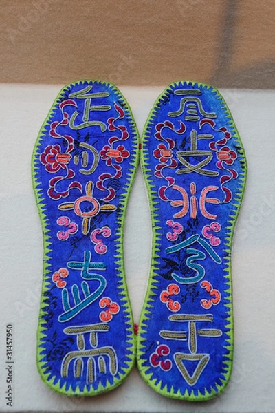 Obraz 水族马尾绣鞋垫