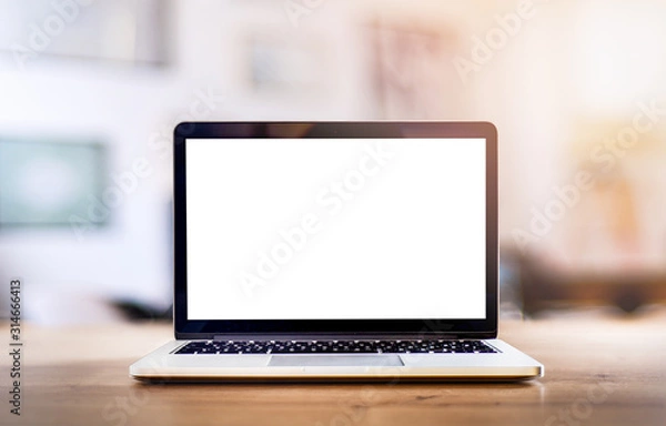 Obraz Makieta komputera białe tło na stole. Laptop z pustym ekranem.