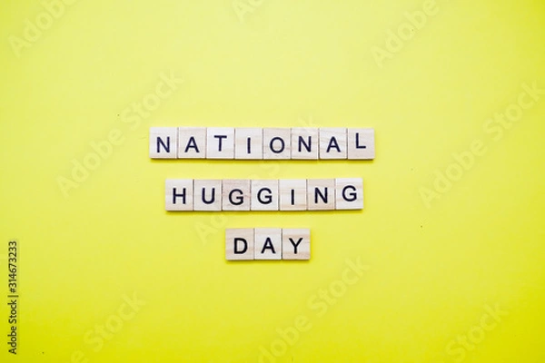 Obraz Words on plain background ; National Hugging Day.