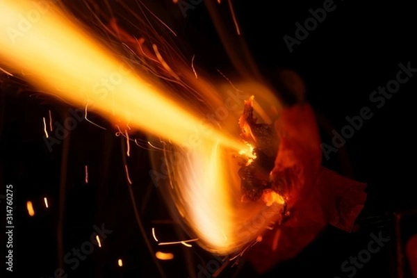 Obraz Macro photo of an exploding firecracker.