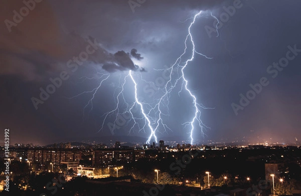 Fototapeta lightning over the city