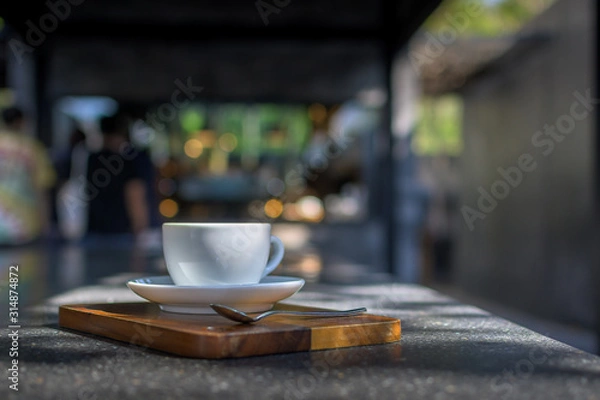 Obraz Coffee Cup on table Cafe shop Interior with Blur background