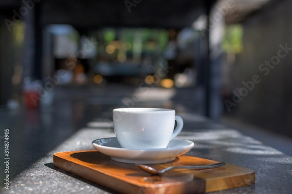 Obraz Coffee Cup on table Cafe shop Interior with Blur background