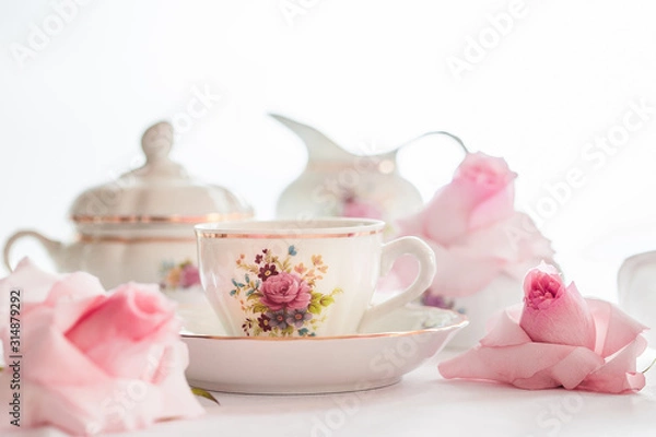 Obraz A set of  floral rose pattern fine china porcelain tea set with a tea-pot, sugar pot, creamer, and tea cup