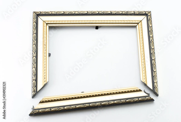 Fototapeta  Broken wooden photo frame on a big background