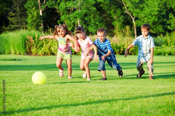 Obraz Kids group playing with ball