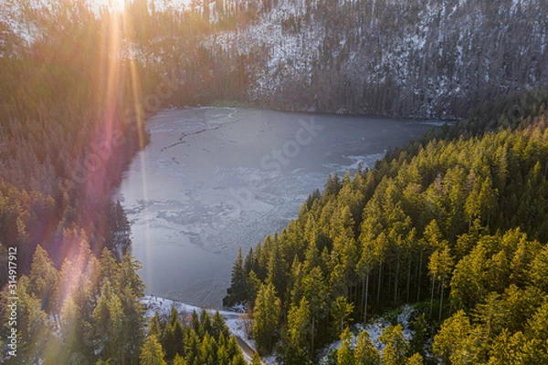 Fototapeta Cerne jezero in the Bohemian Forest is the largest and deepest natural lake in the Czech Republic. This triangular lake surrounded with spruce forest is located about 6 km northwest of Zelezna Ruda.