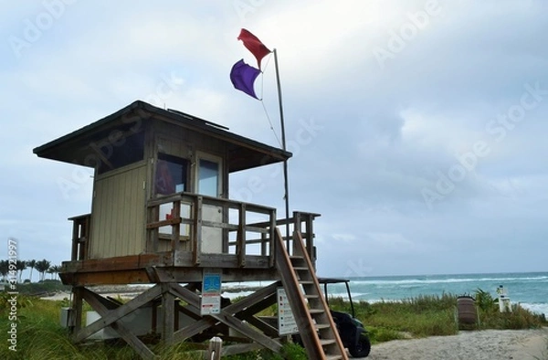 Obraz flag on mast lifeguard tower