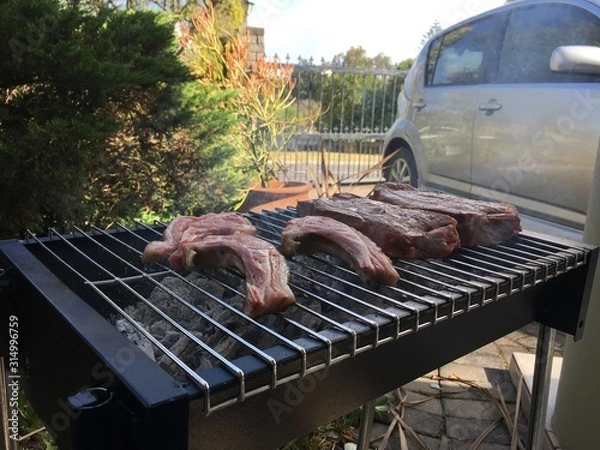 Obraz grilling meat on the grill