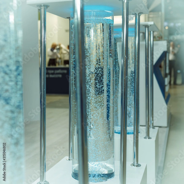 Fototapeta Futuristic glass tube with bubbles