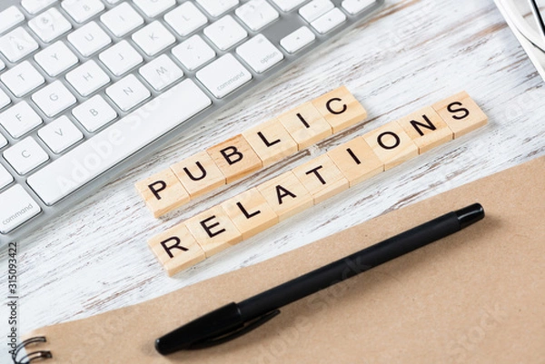 Obraz Public relations concept with letters on cubes