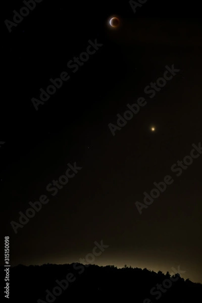 Obraz Total lunar eclipse with planet Mars on the black sky