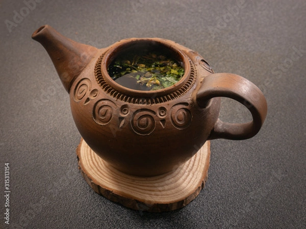 Obraz clay pot with open lid