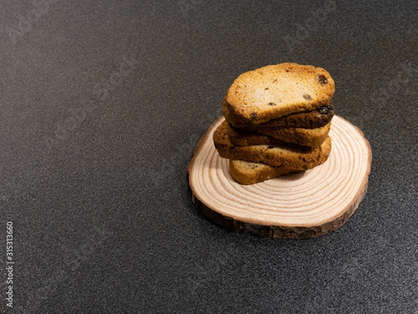 Obraz crackers on a wooden stand. copyspace