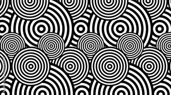 Fototapeta Trendy circular black and white pattern background vector design. Optical illusion spins backdrop.