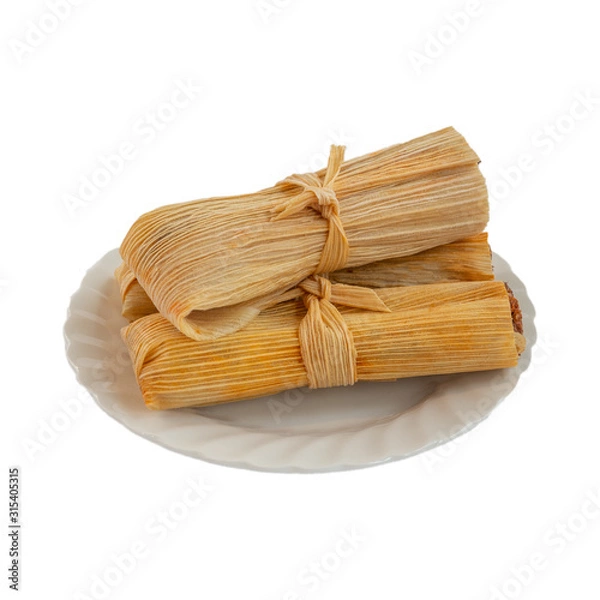 Fototapeta three pork tamales on a plate isolated on white background