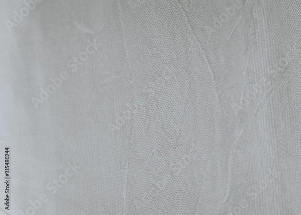 Obraz texture of a white curtain lit with outside light