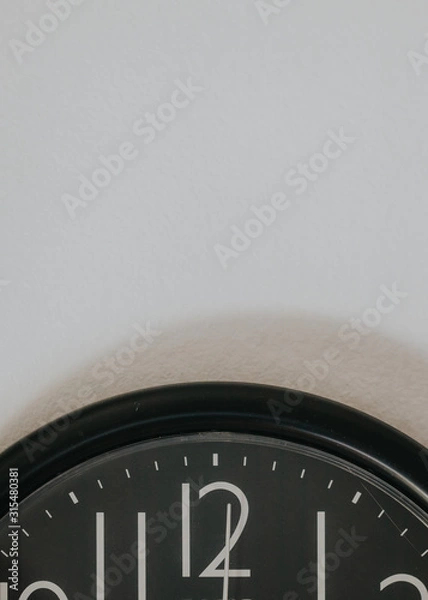 Obraz piece of clock on a white wall