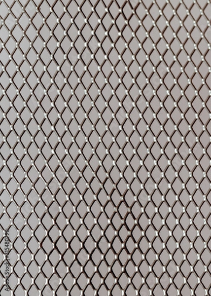 Fototapeta texture of a metal grid from a documentation shelf