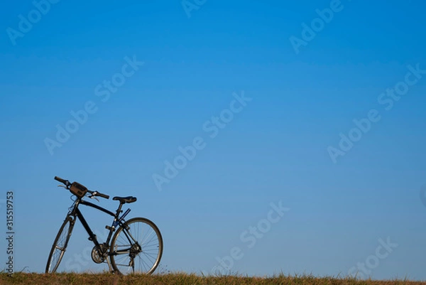 Fototapeta 青空の中のサイクリング（横位置）