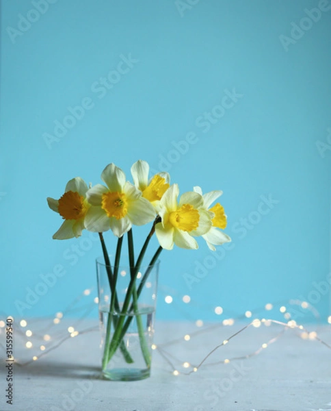 Obraz Easter  background with daffodils and eggs,nest,bunny