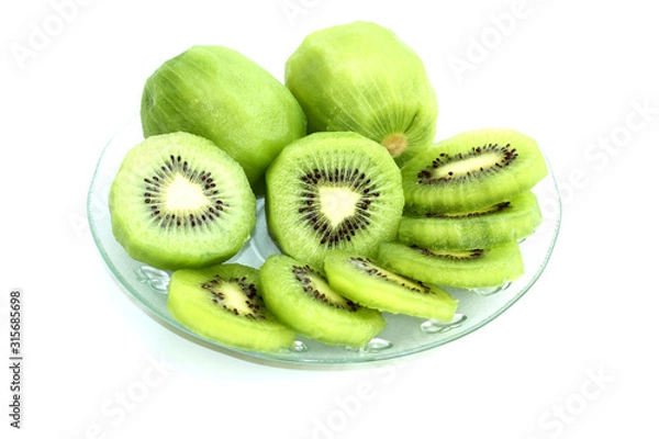Obraz Kiwi fruit cut into pieces.