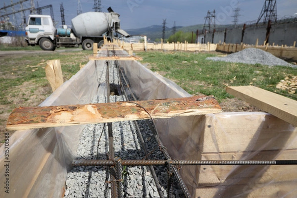 Fototapeta Wooden formwork for the foundation of the house, garage.