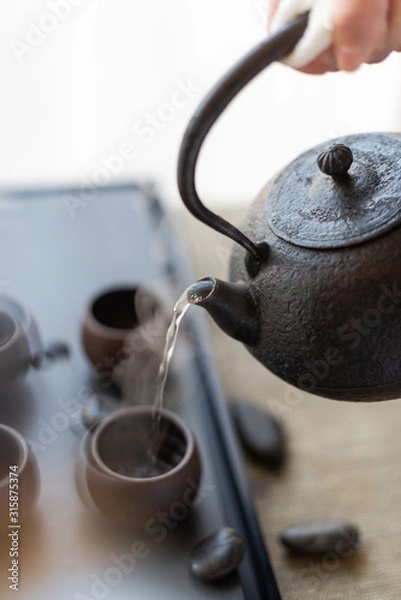 Obraz Chinese pouring tea