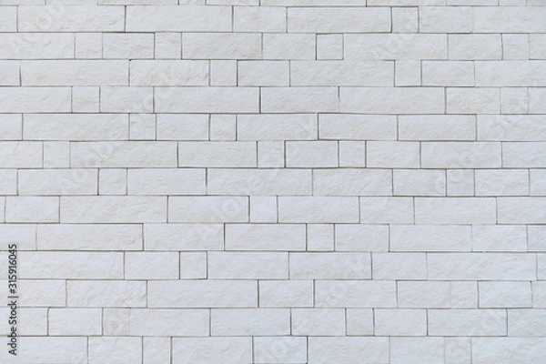 Obraz White brick wall of a building