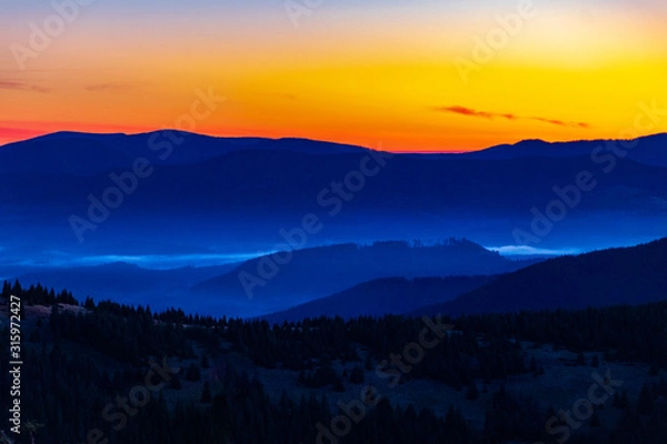 Fototapeta sunset in mountains