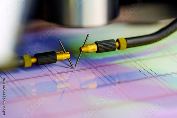 Fototapeta Manual probe system with needles for test of semiconductor on silicon wafer. Selective focus.