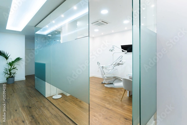 Fototapeta Dentist office. Dentist chair in high class dental clinic. VIP service in medical care. Dentist office. Medical concept.