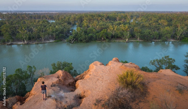 Obraz Scenic view to Murray River from rugged cliff top at Murtho lookout in Riverland. Natural South Australian waterfront scenery in Riverland at sunset