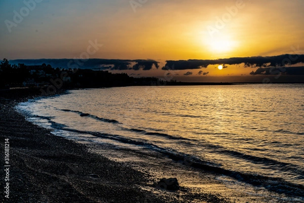 Fototapeta sunset on beach