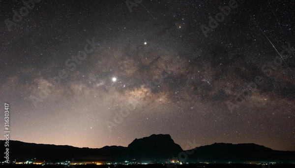 Fototapeta Observers at night have stars, milky way and galaxies filled the dark sky.