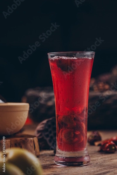 Fototapeta Luo han guo, red dates, black tea, In a clear glass.In ancient China, it had the function of kee