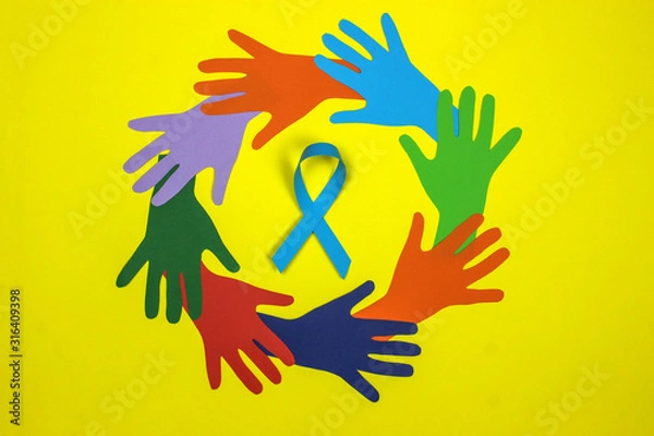 Fototapeta Multicolored hands in a circle with a blue ribbon. Men's health and Prostate cancer awareness campaign concept. Symbol for support men who living with cancer. Copy space.