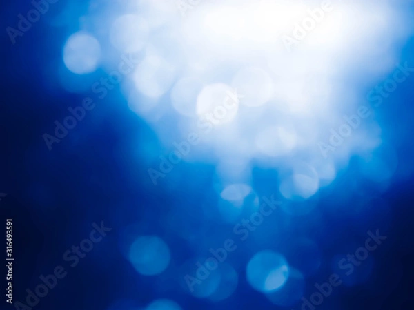 Fototapeta blue bokeh abstract light background.